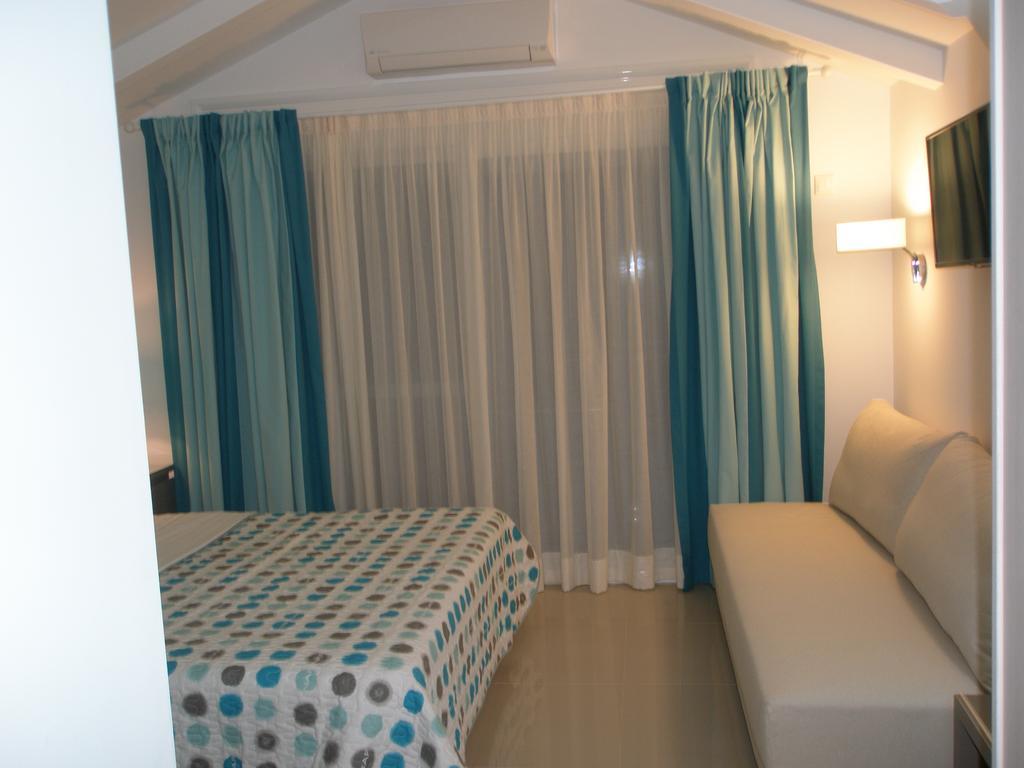 Whitesands Beach Resort Paralia Vrachou Quarto foto